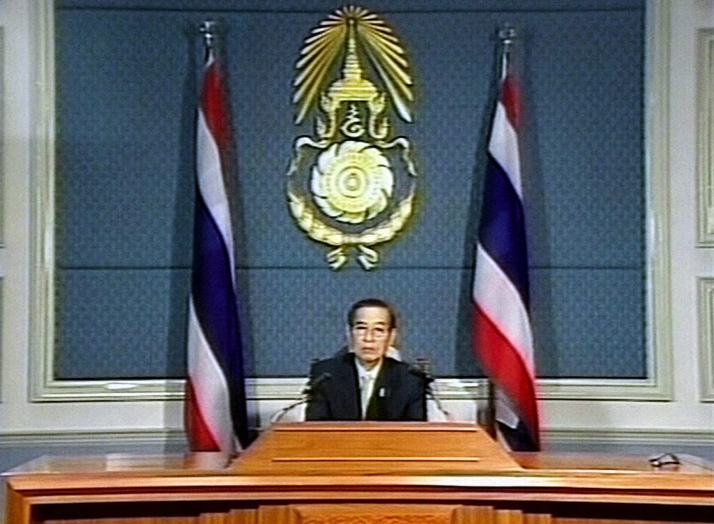 ADDITION - In this TV grab taken off Thai TV Channel 5, senior Thai military officer Major General Prapass Sakuntanat announces on television that Thai armed forces have seized power from Prime Minister Thaksin Shinawatra, in Bangkok 20 September 2006. Thailand's military imposed martial law in Bangkok and revoked an emergency decree declared by Prime Minister Thaksin Shinawatra after staging a coup against the premier, a top general said. Thailand's military commander Lieutenant General Sonthi Boonyaratglin said the armed forces had taken control of the country. AFP PHOTO/Channel 5 / AFP PHOTO / CHANNEL 5 / STR