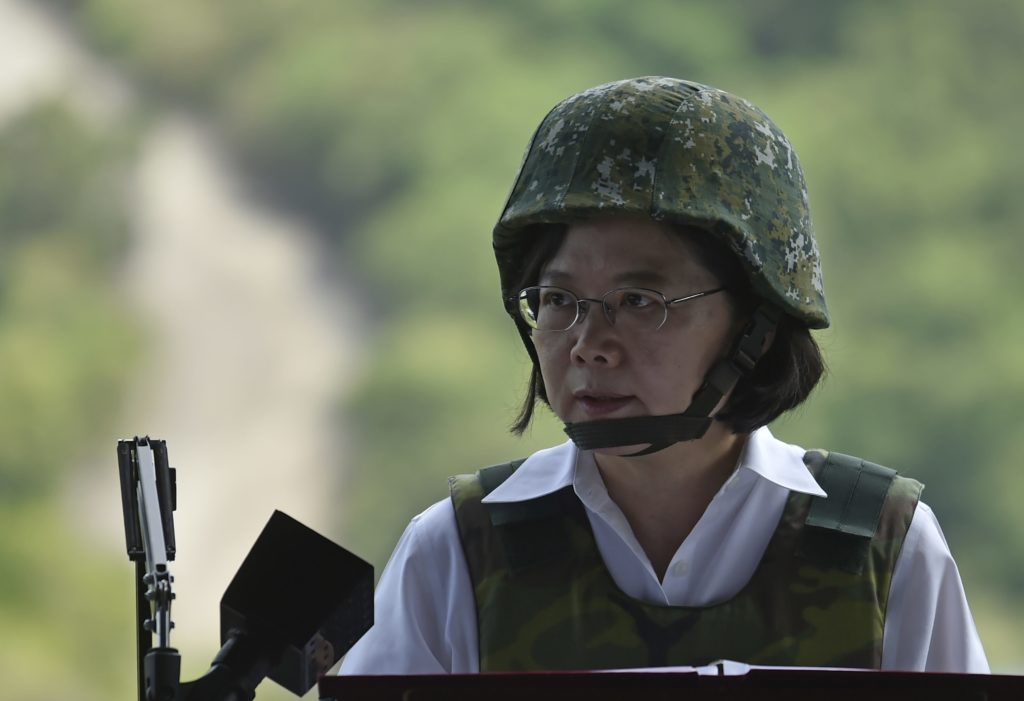 Taiwanese President Tsai Ing-wen speaks during the annual Han Guang life-fire drill in southern Pingtung on August 25, 2016. Taiwan president Tsai Ing-wen said the island's army needs to find a clear direction and face its shortcomings as she presided over a live-fire drill amid cooling relations with Beijing. / AFP PHOTO / SAM YEH