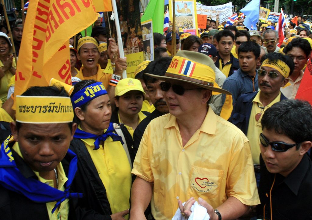 Sondhi Limthongkul, a leader of People's Alliance for Democracy (PAD), leads a protest rally against Thai premier Thaksin Shinawatra in front of American embassy in Bangkok, 14 July 2006. Leaders of the anti-Thaksin protest movement delivered letters to six embassies to urge the international community not to support the embattled premier. AFP PHOTO/ str / AFP PHOTO / STR