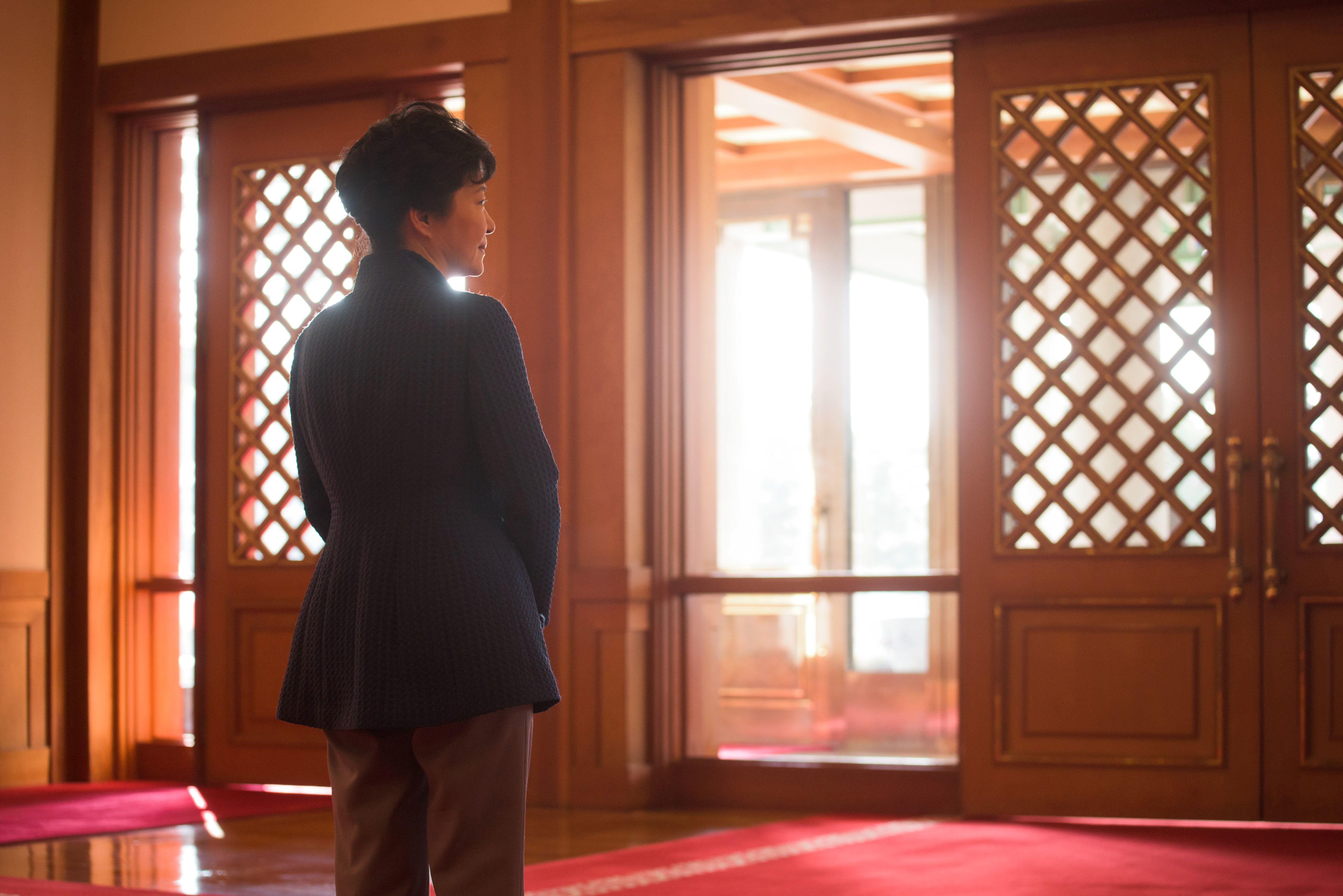 (FILES) This file photo taken on February 26, 2015 shows South Korea's President Park Geun-Hye at the presidential Blue House in Seoul. Park was to address the nation on November 4, 2016 over a corruption scandal that has engulfed her administration and triggered the arrest of a close personal friend accused of meddling in state affairs. / AFP PHOTO / ED JONES